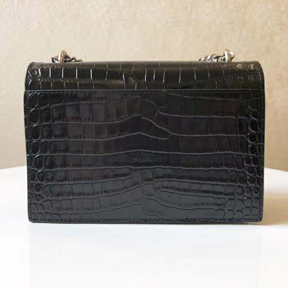 Side angle showing supple crocodile embossed leather texture on Saint Laurent YSL bag