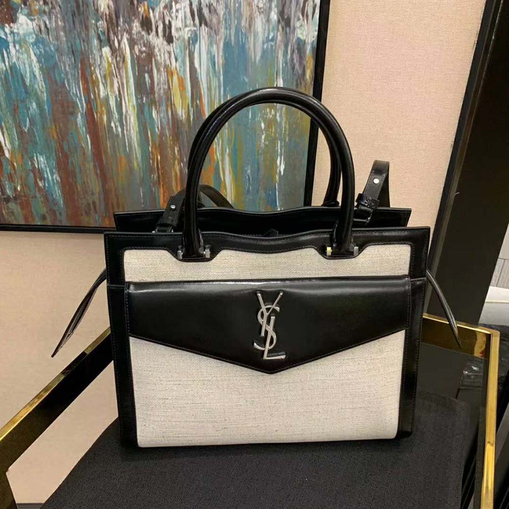 Side angle showing structured silhouette of Saint Laurent Uptown Large Tote