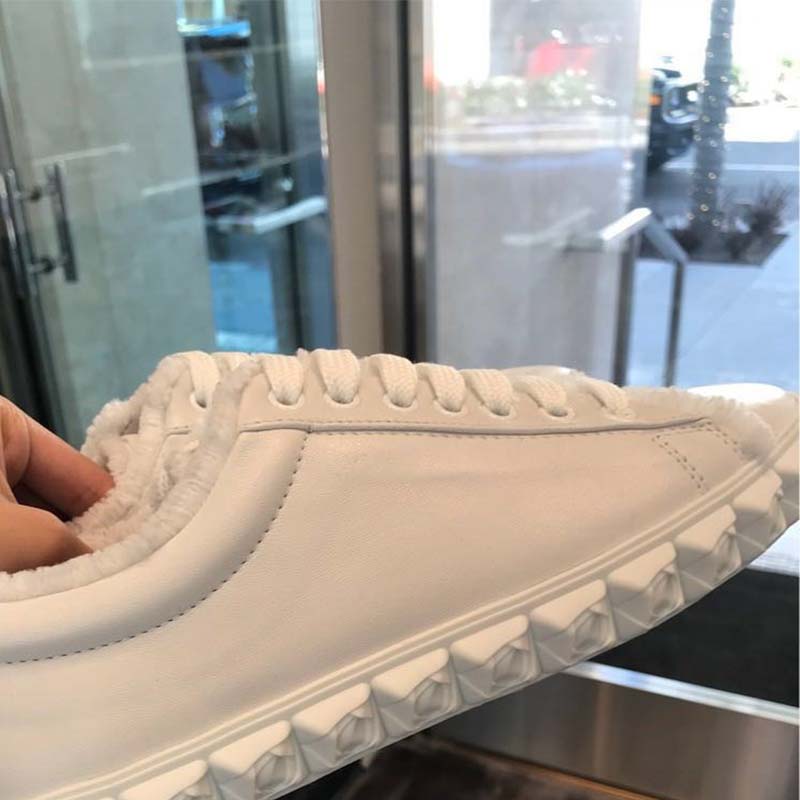 Top view of Stuart Weitzman Women The Fringiecoverstory Sneaker with lace-up closure