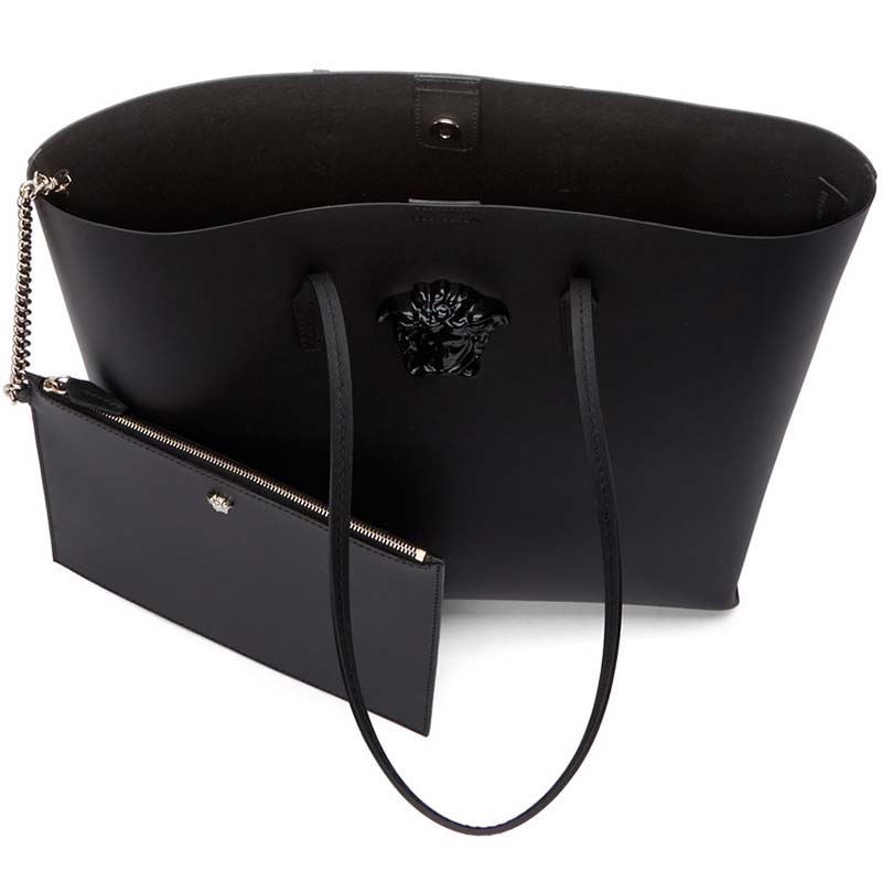 Close-up detail of gold Medusa hardware on Versace Large Medusa Leather Tote Bag-Black