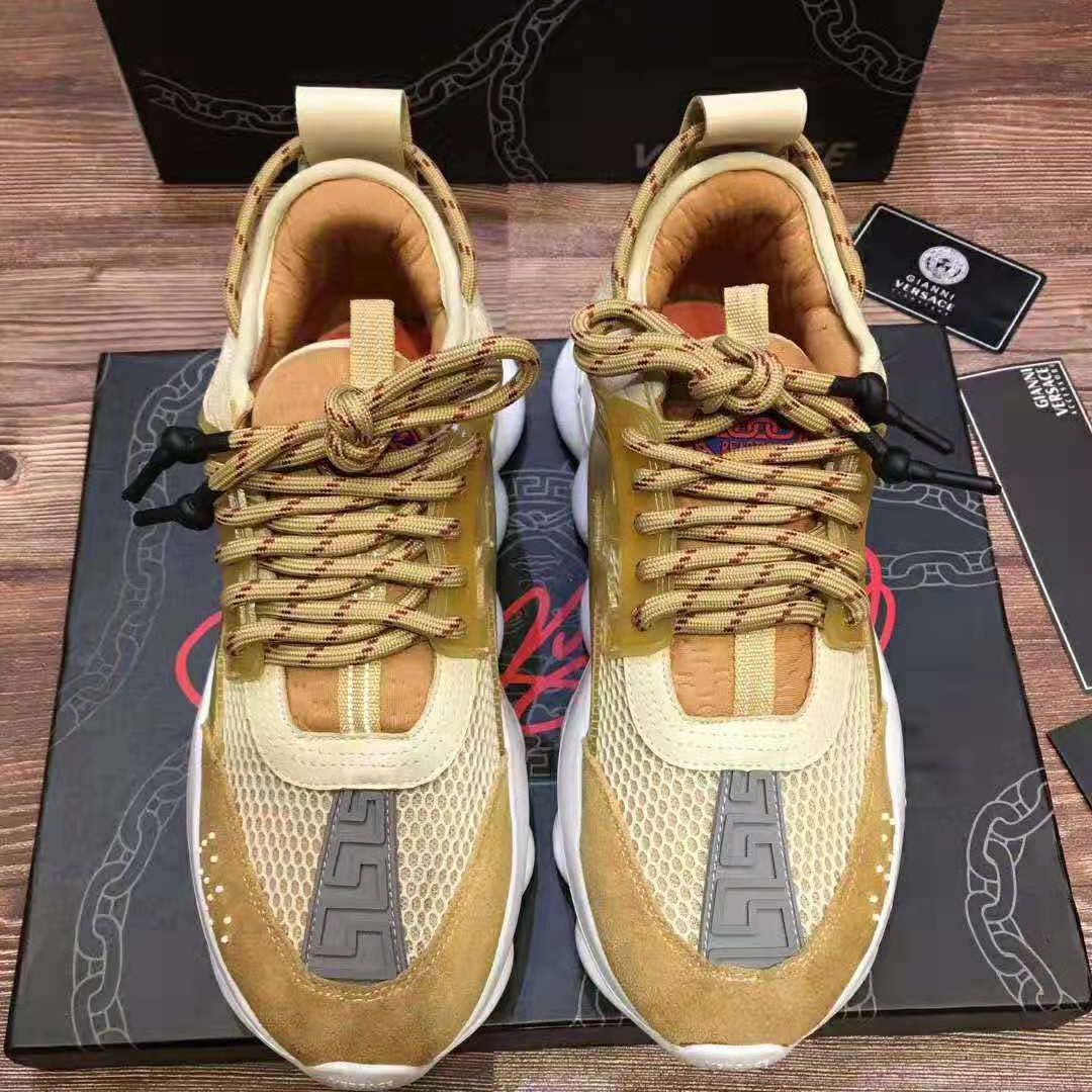 Top-angle shot of lace-up closure on Versace Men Chain Reaction Sneakers-Gold
