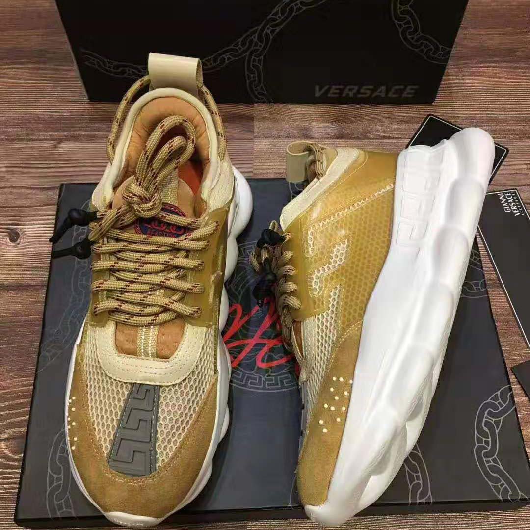 Close-up of chain-link sole detail on Versace Men Chain Reaction Sneakers-Gold