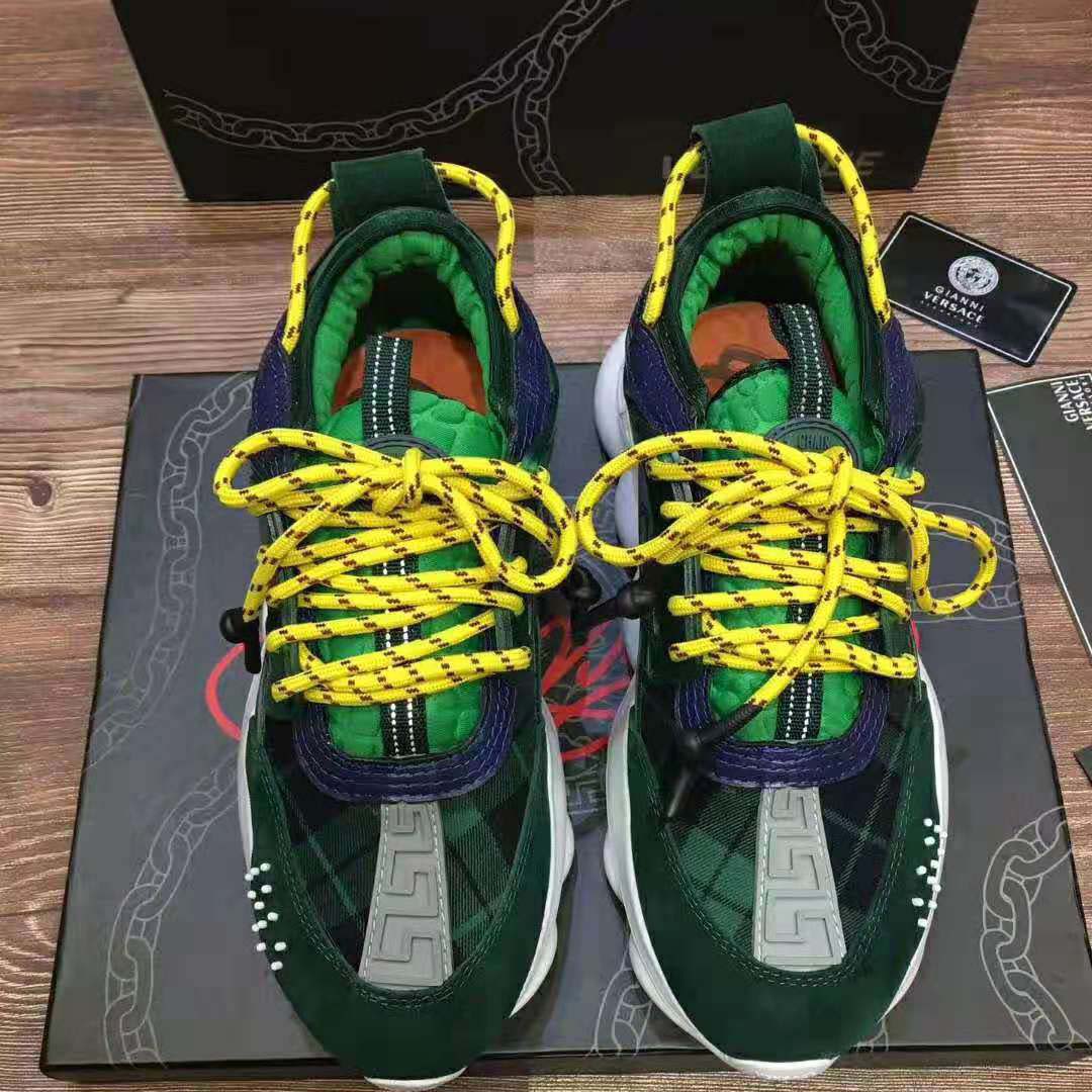 Close-up of green leather and lace details on Versace Men Chain Reaction Sneakers-Green