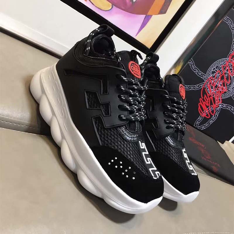 Close-up of black leather and signature Chain Reaction sole detail