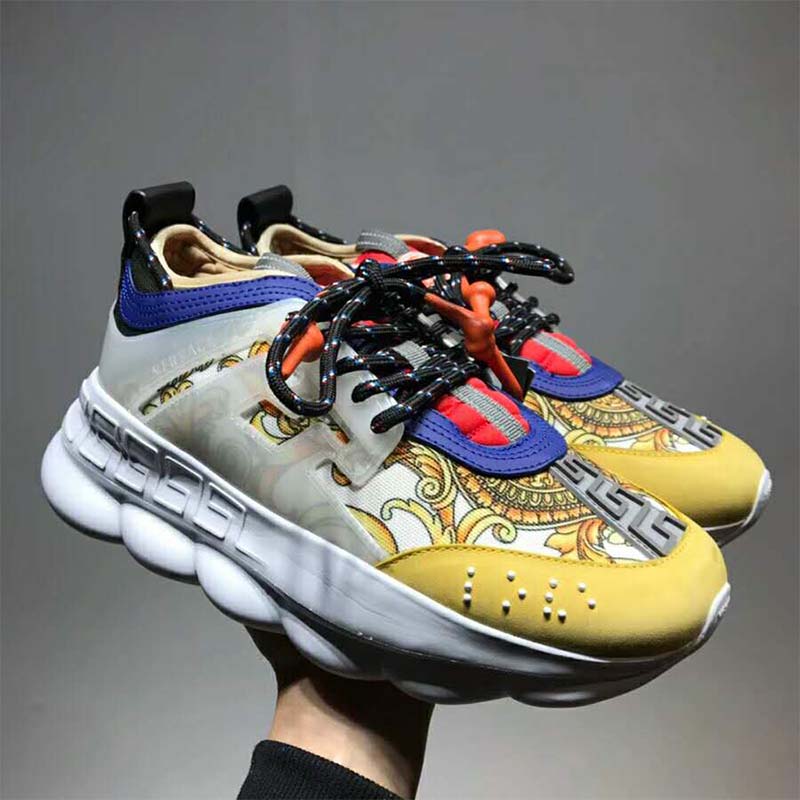 Close-up of chain-link sole detail on Versace Men Shoes Chain Reaction Sneakers-Yellow