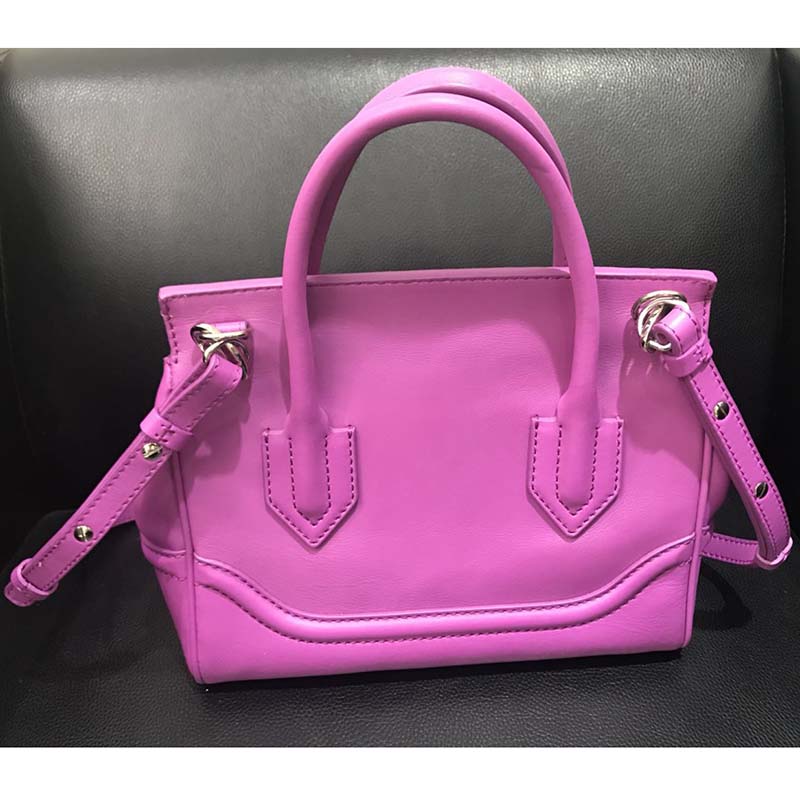 Side angle showing silhouette of Versace Palazzo Empire Medium Bag pink leather