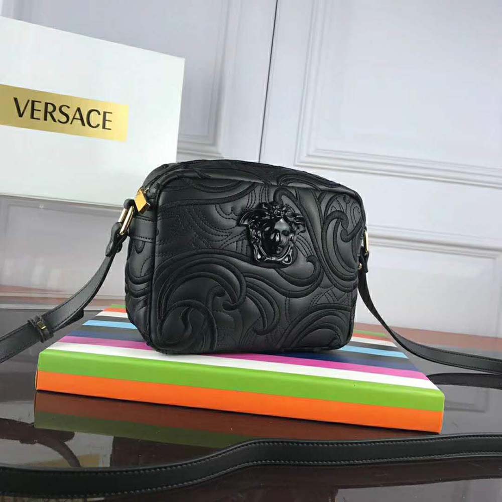 Side profile showing silhouette of Versace Women Embroidered Baroque Shoulder Bag-Black