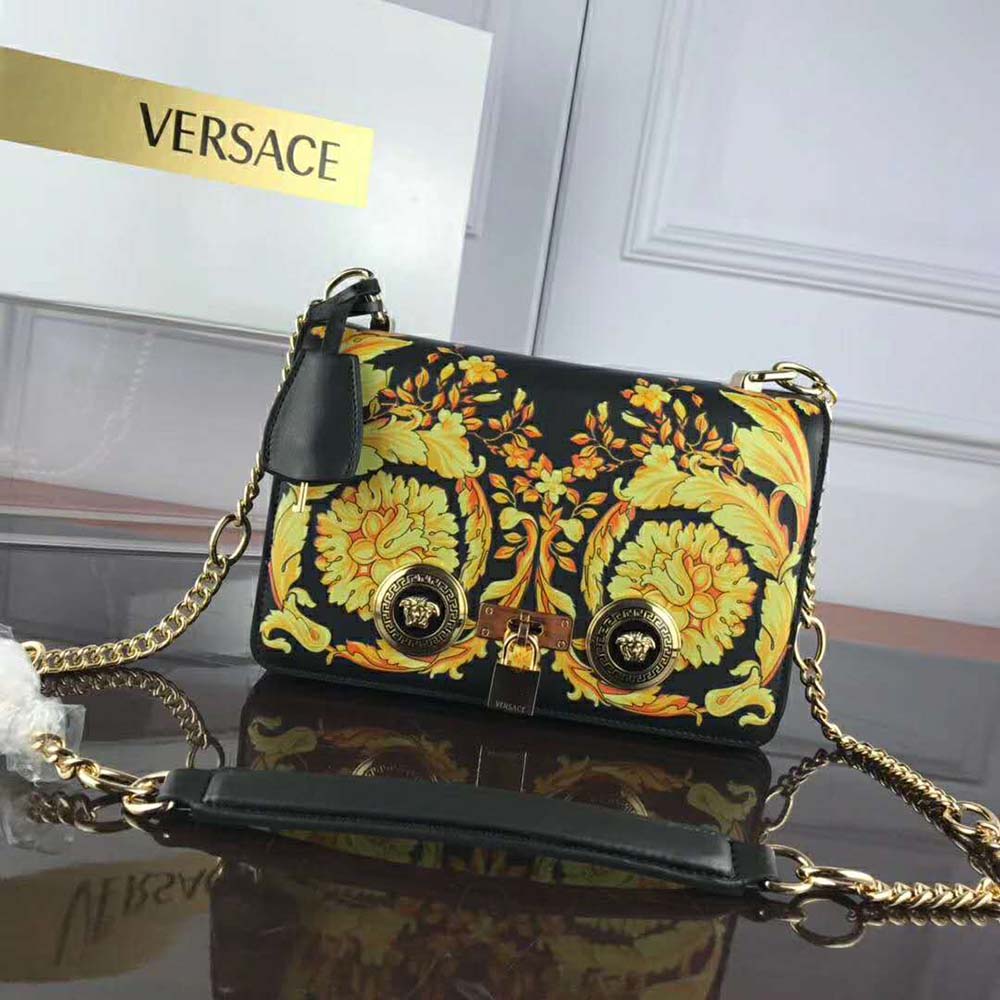 Close-up detail of Barocco gold-tone clasp on Versace Women Medium Barocco Icon Shoulder Bag