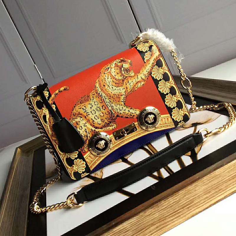 Close-up of gold Medusa hardware on Versace Women Signature Pillow Talk