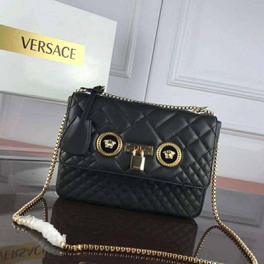Close-up of gold Medusa hardware on Versace Women Small Quilted Icon Shoulder Bag