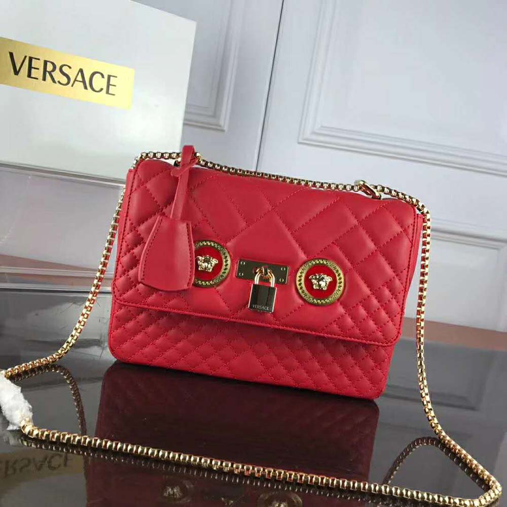 Close-up of gold Medusa hardware on Versace Women Small Quilted Icon Shoulder Bag
