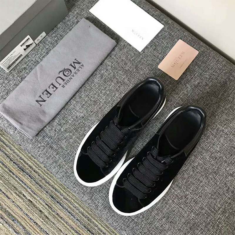 Top angle showing laces and tongue of Alexander Mcqueen Unisex Oversized Sneaker With Black Velvet Calf Leather
