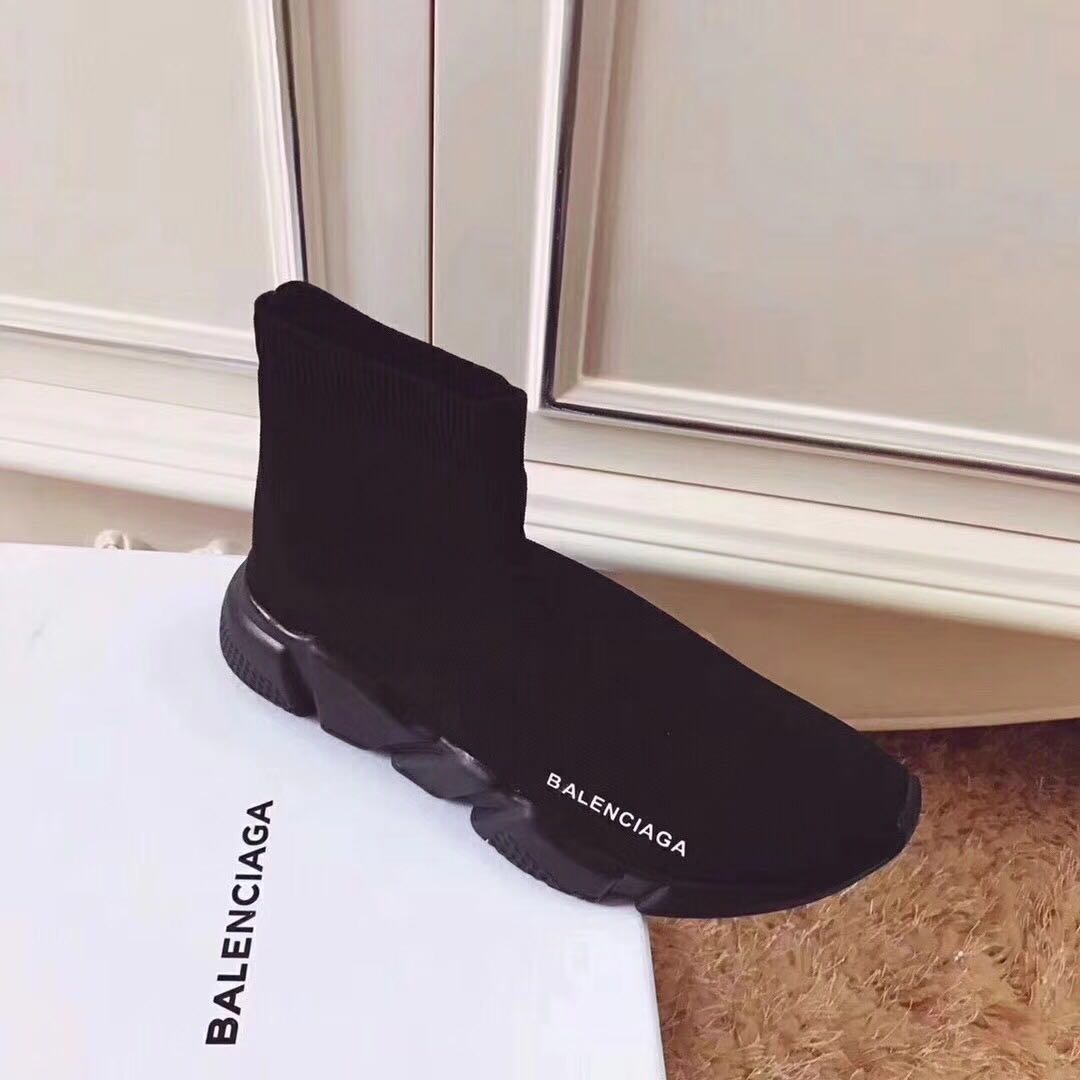 Close-up of textured rubber sole on Balenciaga Unisex Speed Trainer Shoes Black