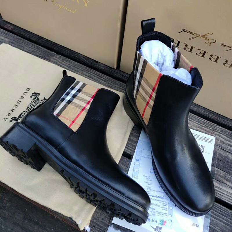 Top view of black leather Burberry Women Vintage Check Detail Chelsea Boots