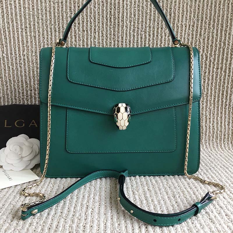 Close-up of serpenti head clasp on Bvlgari Women Large Flap Cover Bag “Serpenti Forever”