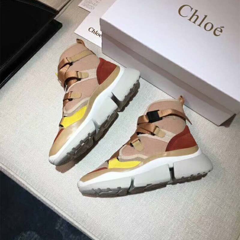 Overhead angle showing lace-up detail on pink Chloe Sonnie high-top sneaker