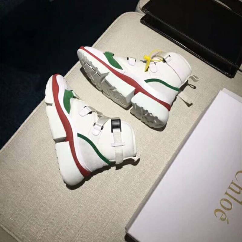 Close-up on signature Chloé logo heel tab of Sonnie High-Top Sneaker