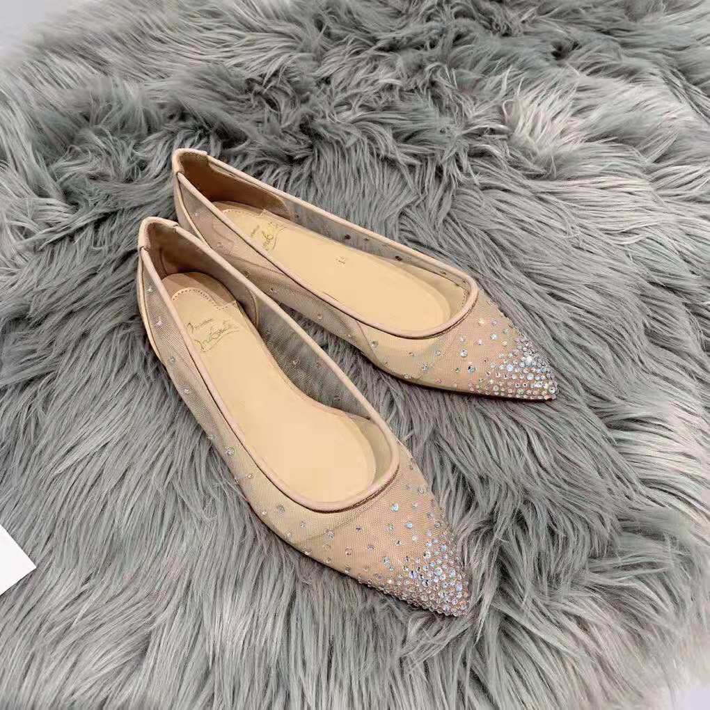 Overhead shot showcasing sandy leather and silhouette of ballet flat