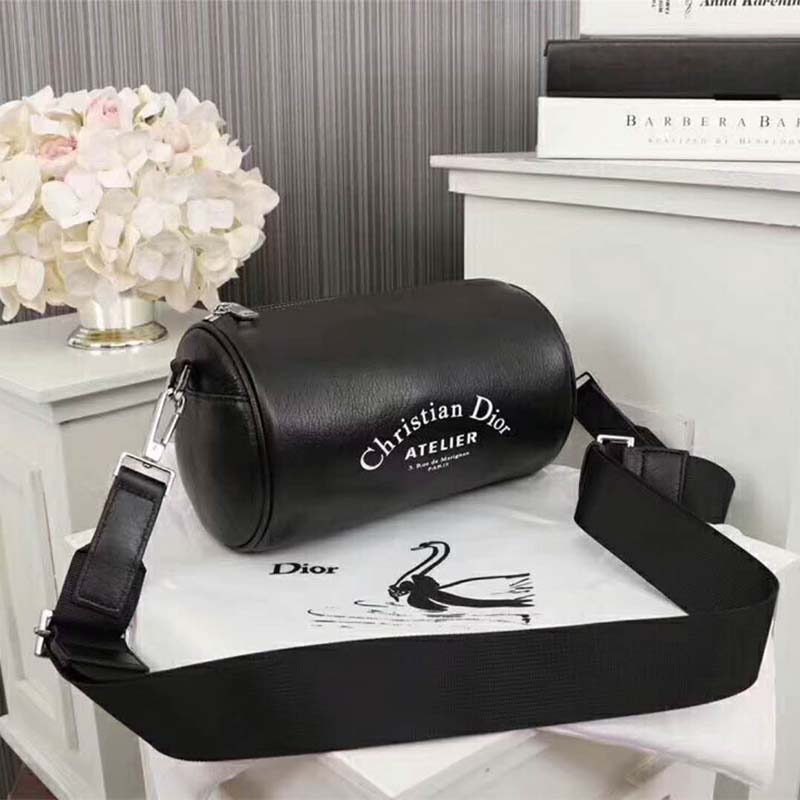 Side view of Dior Unisex Black Grained Calfskin “Roller” Pouch with zipper open
