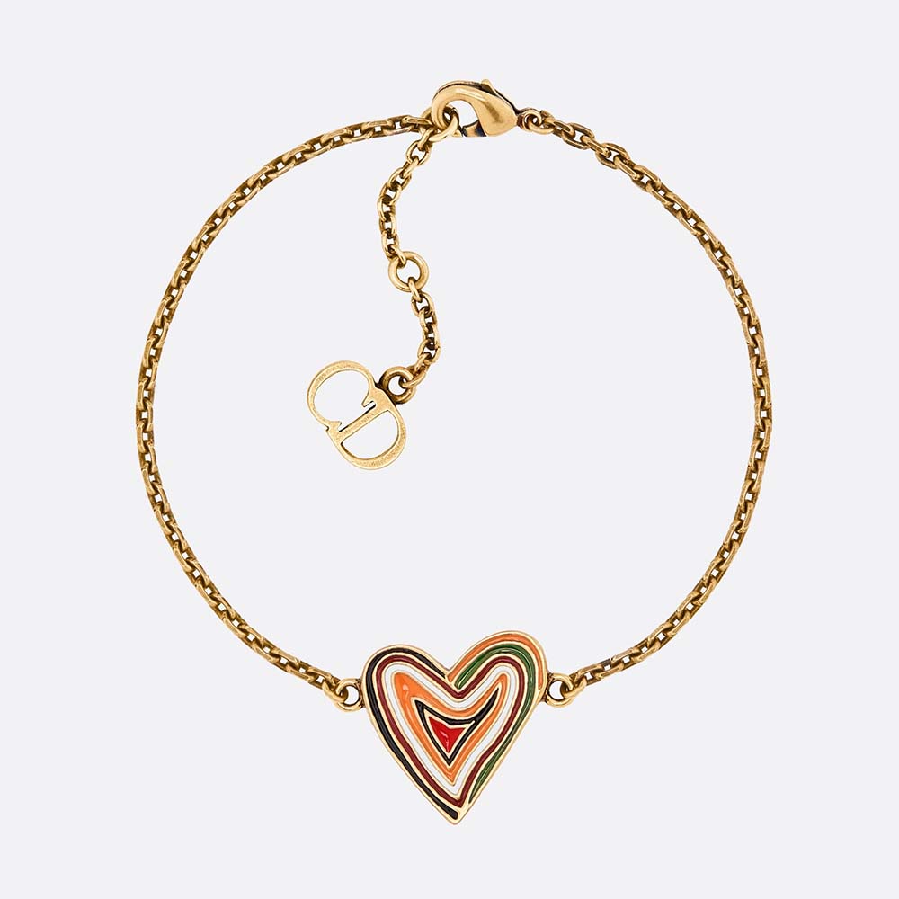 Close-up of Dior Women “Dioramour” Heart Bracelet gold heart charm