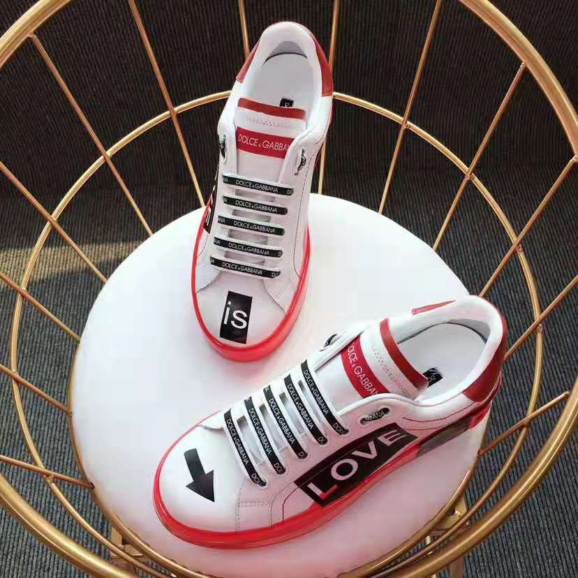 Overhead shot highlighting silhouette and vibrant red color of Dolce Gabbana D&G sneakers