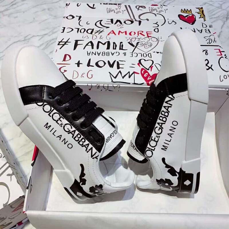 Close-up of printed patent calfskin and branded hardware on Dolce Gabbana D&G Portofino Sneakers