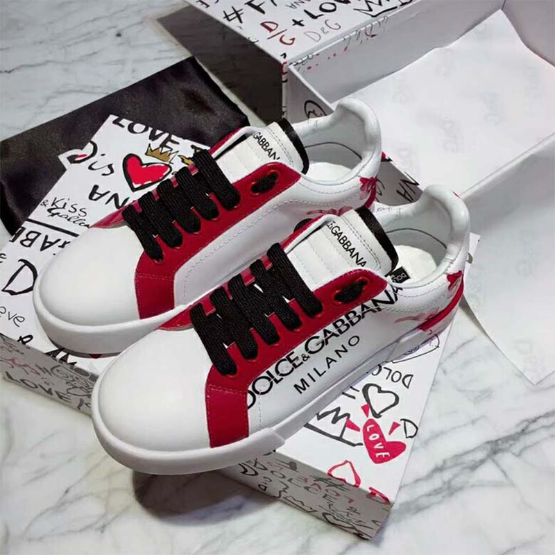 Close-up detail of signature D&G logo hardware on Portofino Sneakers