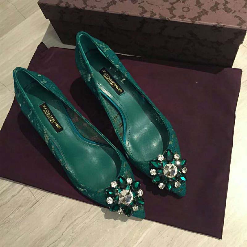 Close-up of crystal embellishments on Dolce Gabbana D&G green pumps