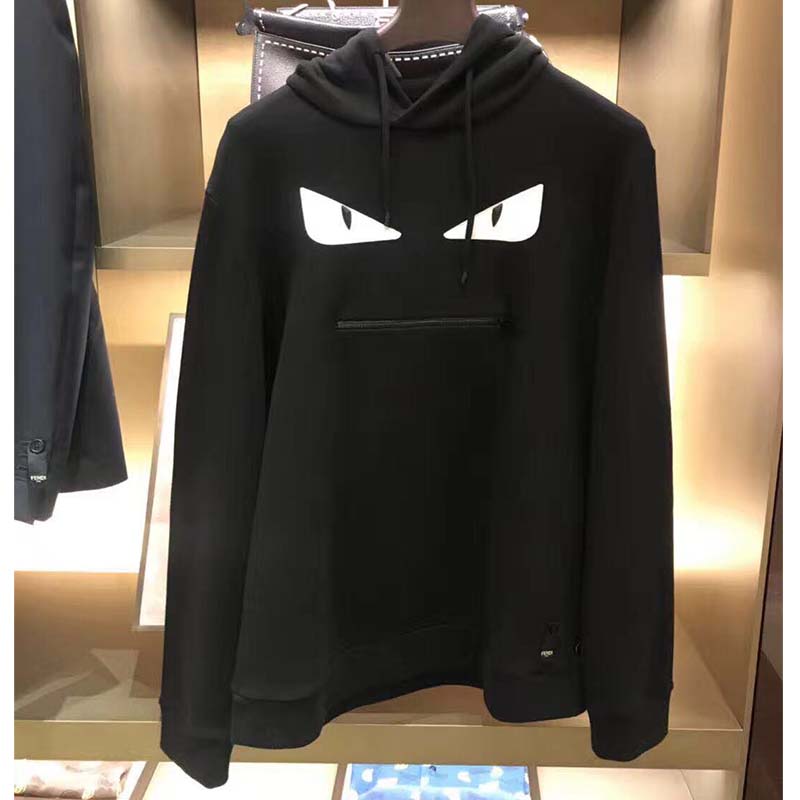 Close-up detail of Fendi logo embroidery on black sweatshirt