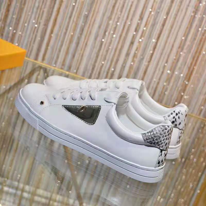 Overhead view of Fendi Men Sneakers White Leather High-Tops with laces
