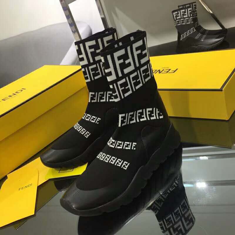 Overhead view showing laces and tech fabric texture on Fendi high-tops