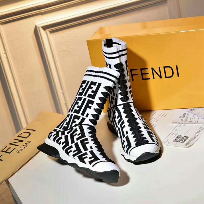 Close-up of multicolor fabric and white leather on Fendi sneaker boots