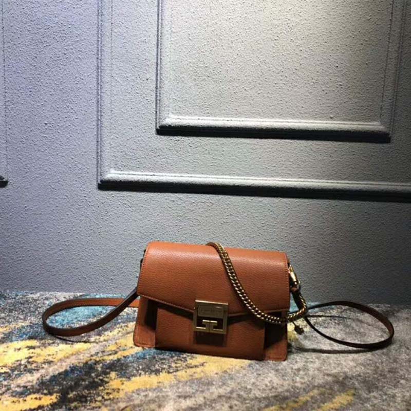 Close-up of gold-tone GV3 clasp on Givenchy Women Mini GV3 Bag