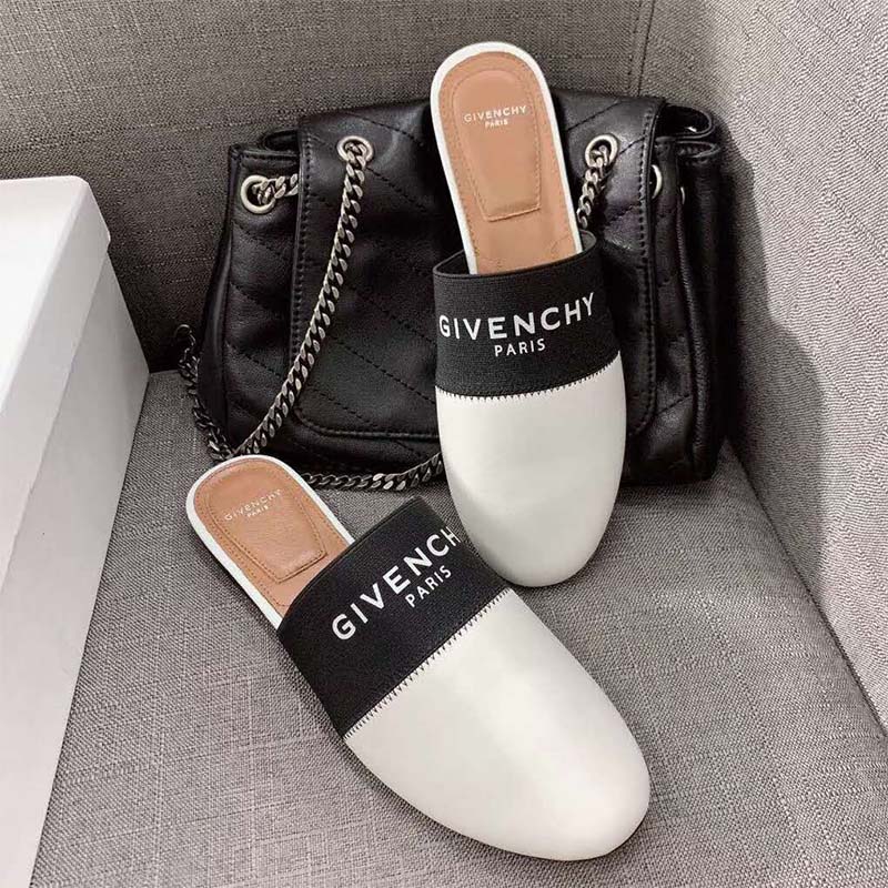 Back angle showing open heel design of Givenchy Paris Leather Mules-White