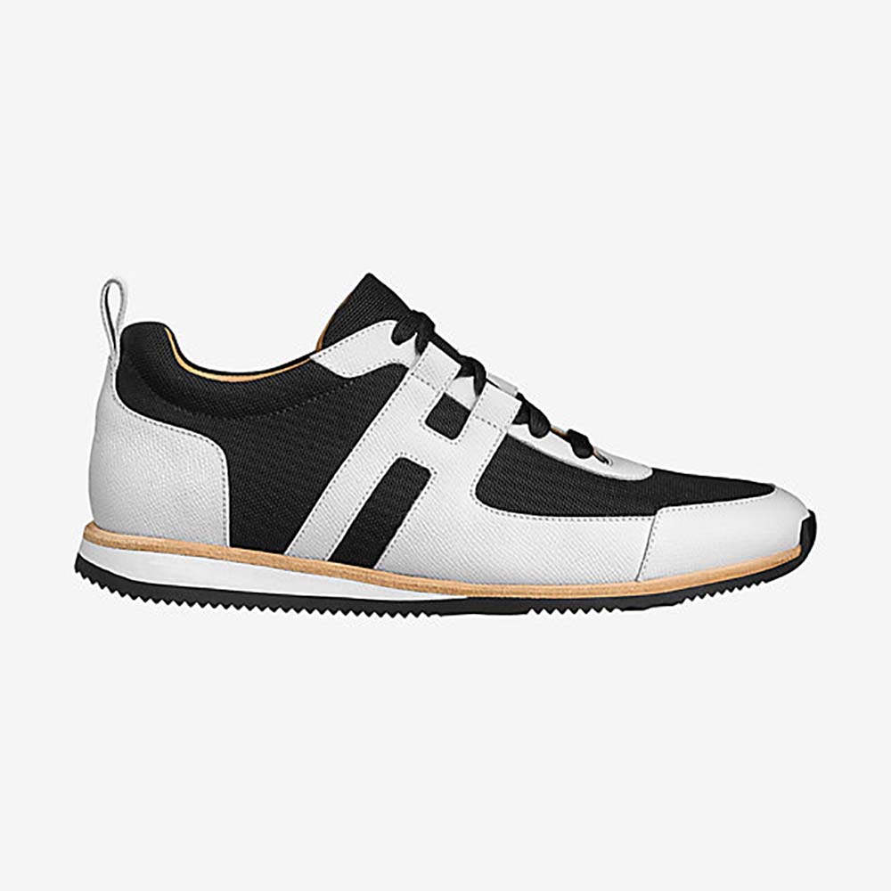 Side profile of Hermes Men Partner Sneaker Shoes Black showing leather texture