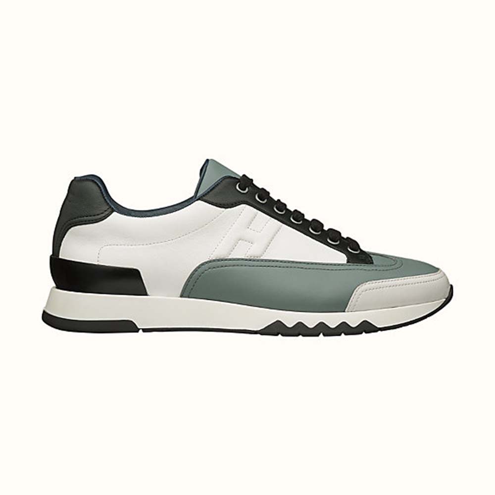Side view of Hermes Men Trail sneaker in Calfskin-Blue