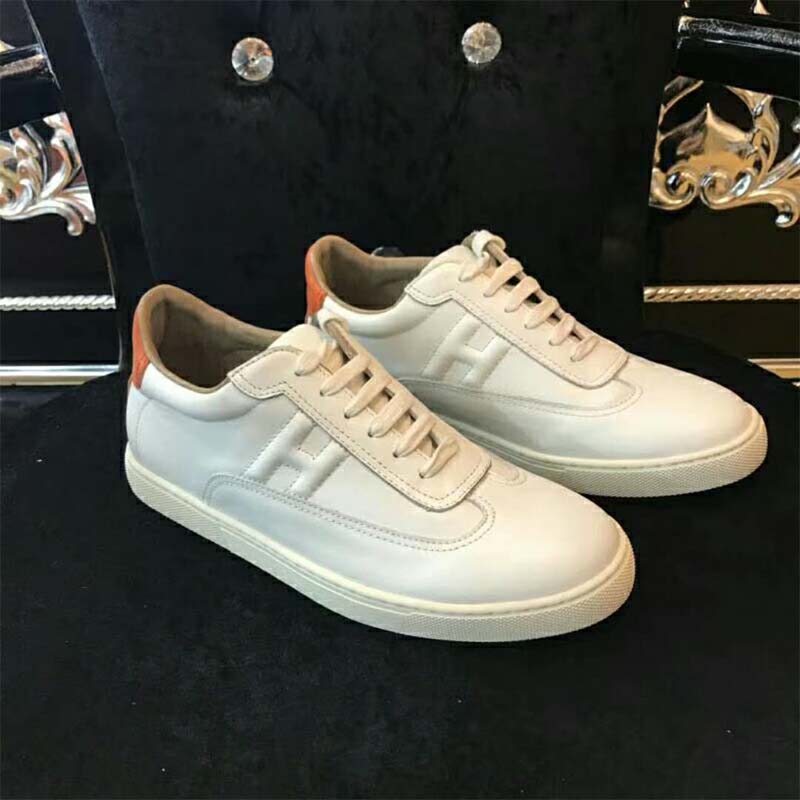 Close-up of white calfskin leather texture on Hermes Unisex Shoes Quicker Sneaker-White