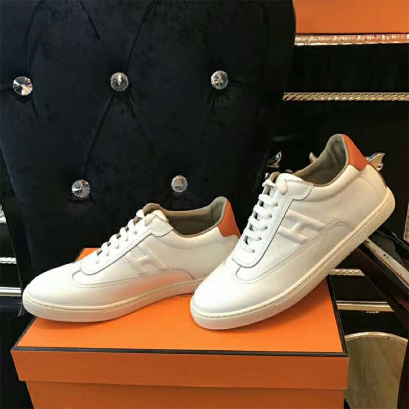 Back view highlighting subtle Hermes logo embossed on heel of Quicker Sneaker