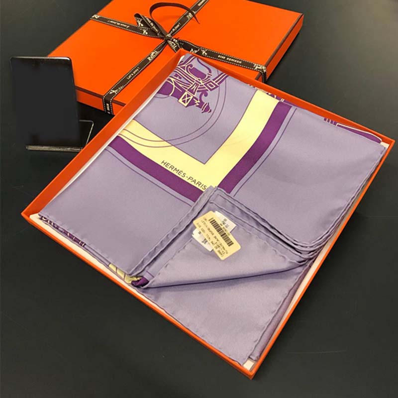 Close-up detail of purple silk and Hermes Ex-Libris print