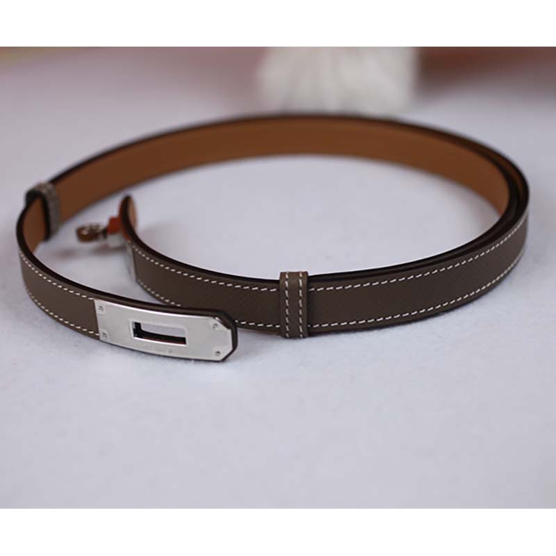Close-up on polished silver hardware of Hermes Women Kelly Belt