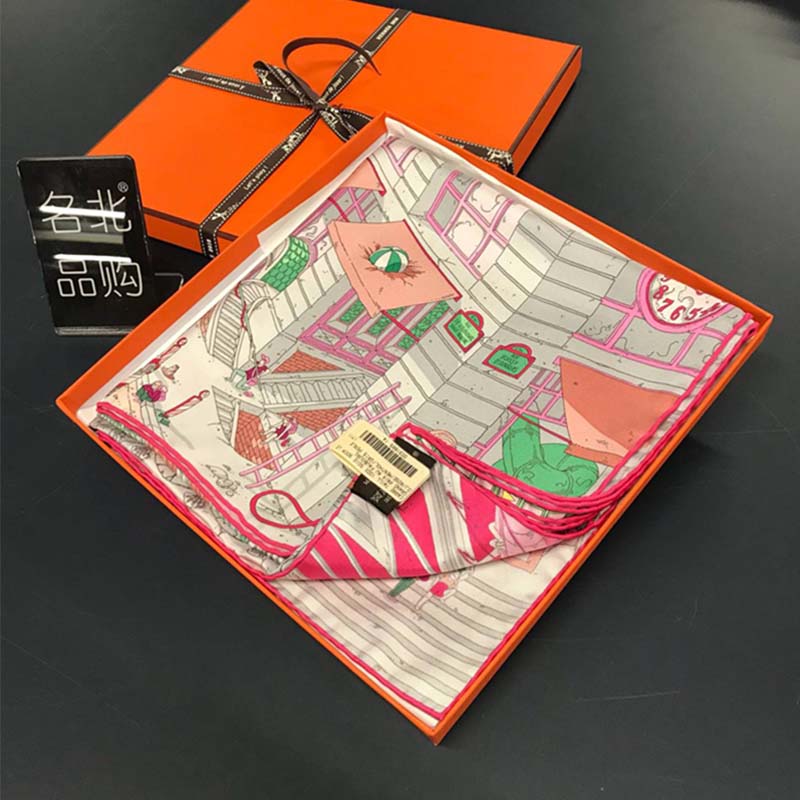 Close-up detail of Hermes equestrian motifs on white Hermes Women Le Grand Prix Du Faubourg Scarf
