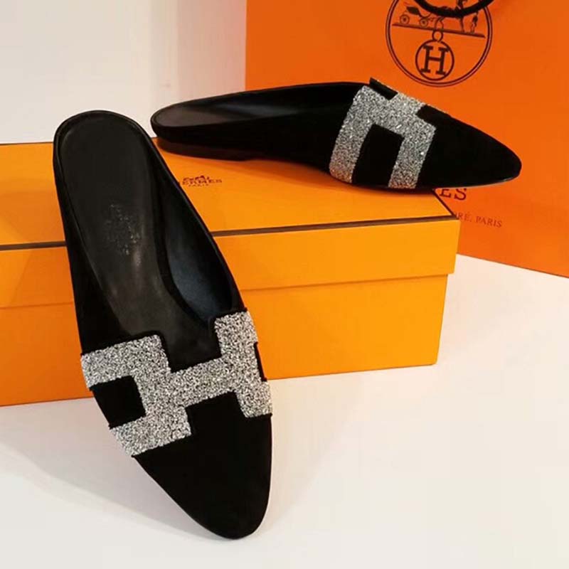 Top-down angle on open-back design of Hermes Women Roxane Mule Shoes Black