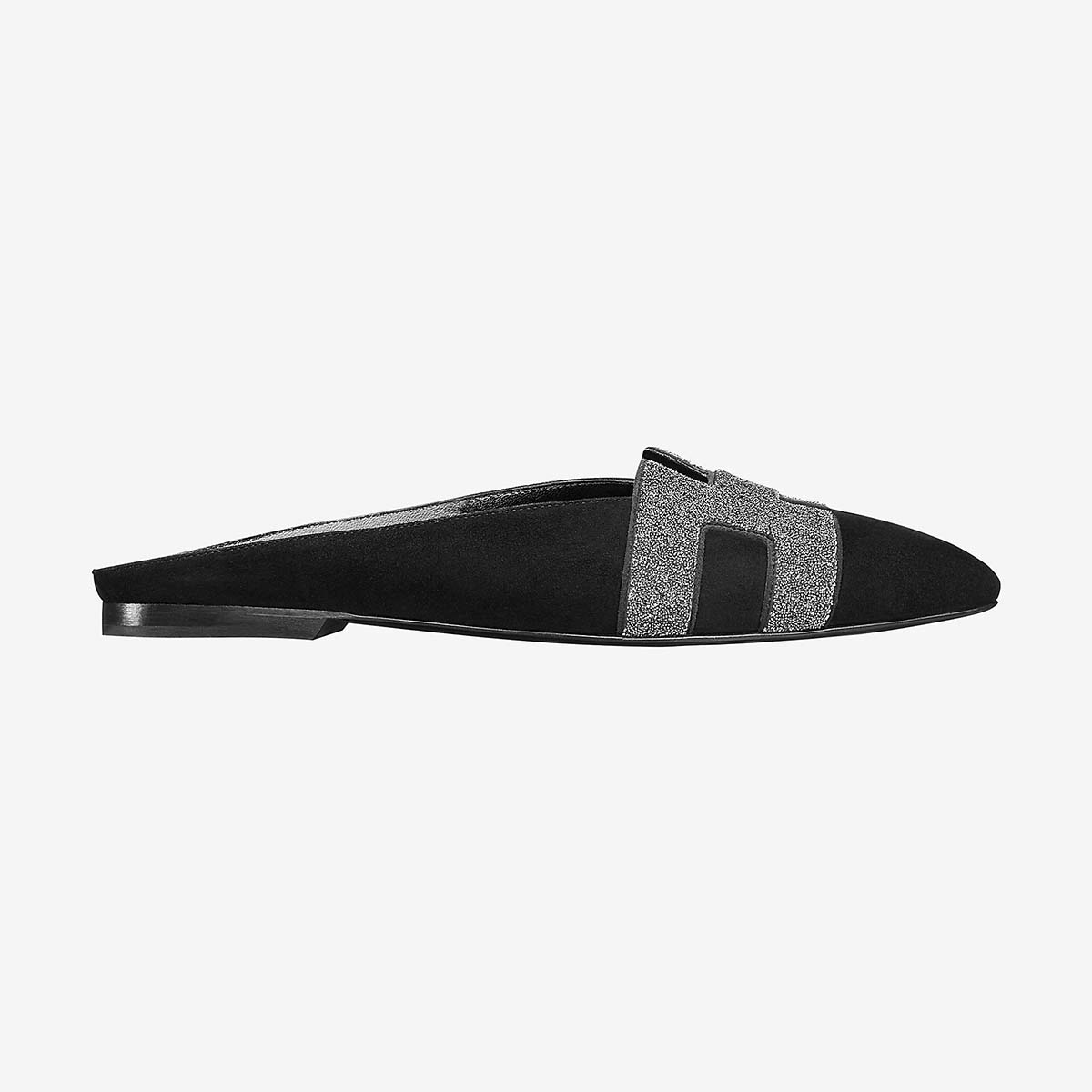 Side view of Hermes Women Roxane Mule Shoes Black showing sleek leather