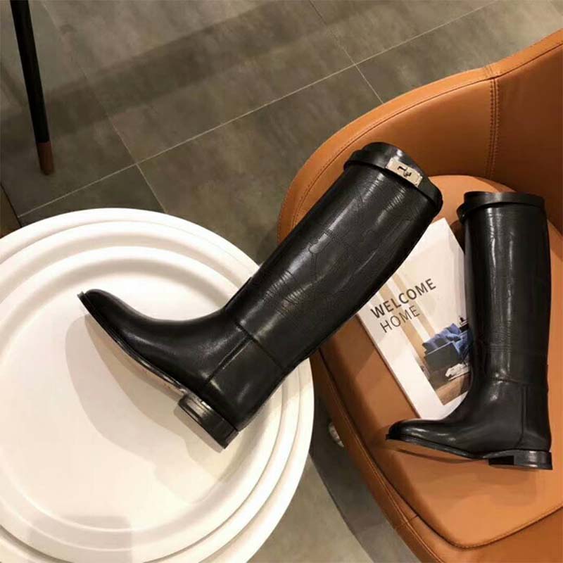 Close-up of silver buckle detail on Hermes Women Shoes Jumping Boot
