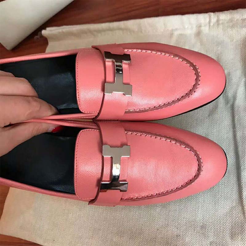 Close-up on Hermes signature silver hardware on Paris Loafer-Pink
