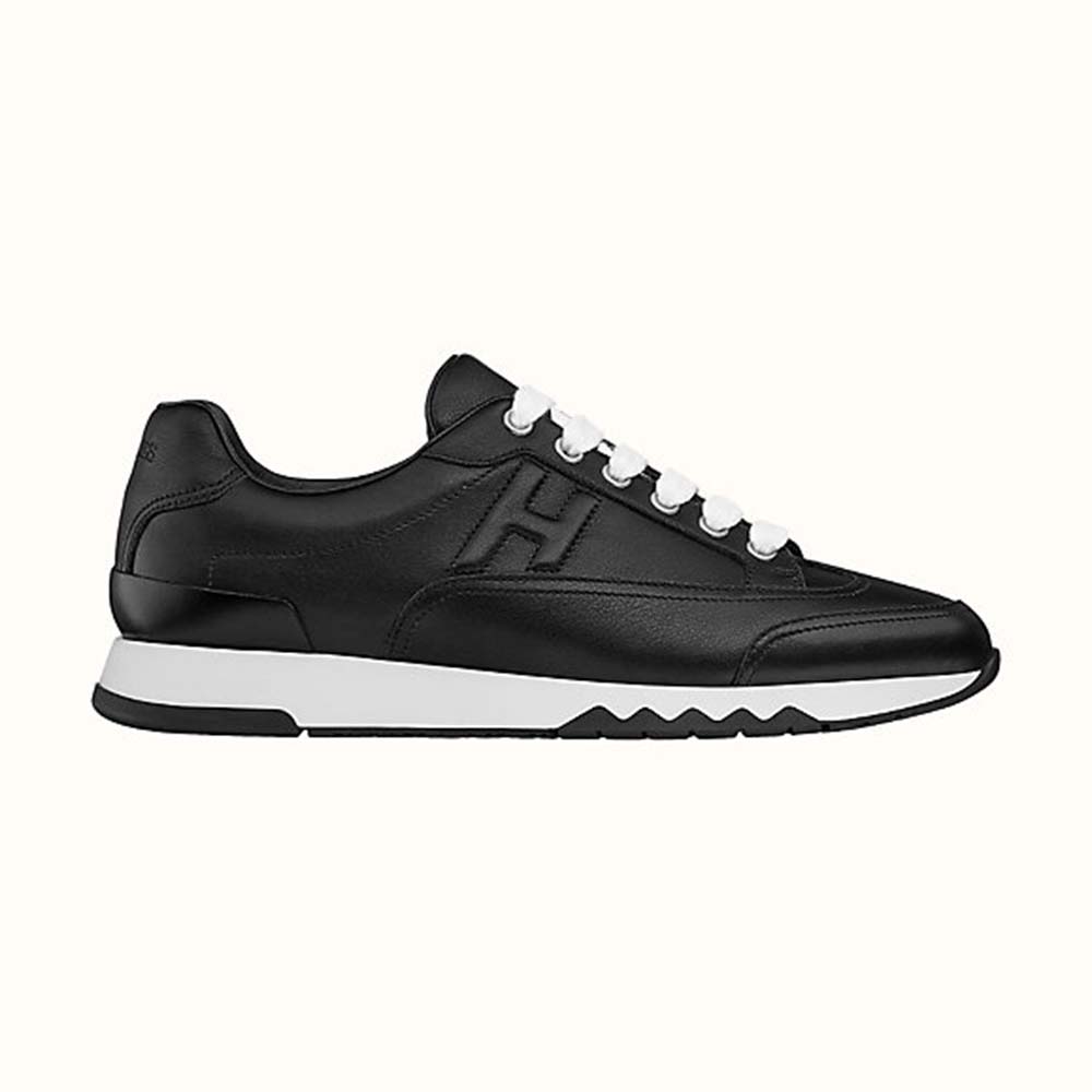 Side profile of Hermes Women Trail sneaker in Calfskin-Black