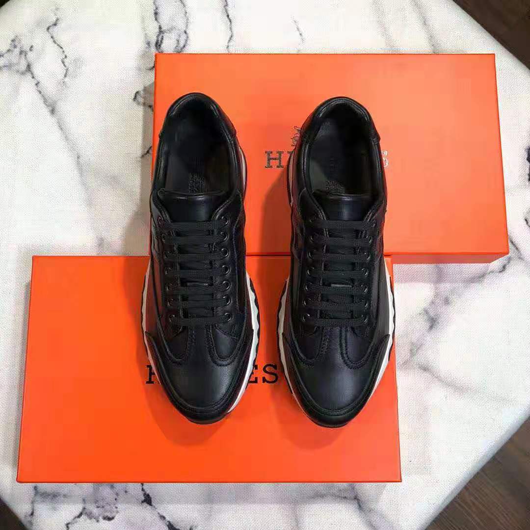 Top view showing lace-up detail on Hermes Women Trail sneaker