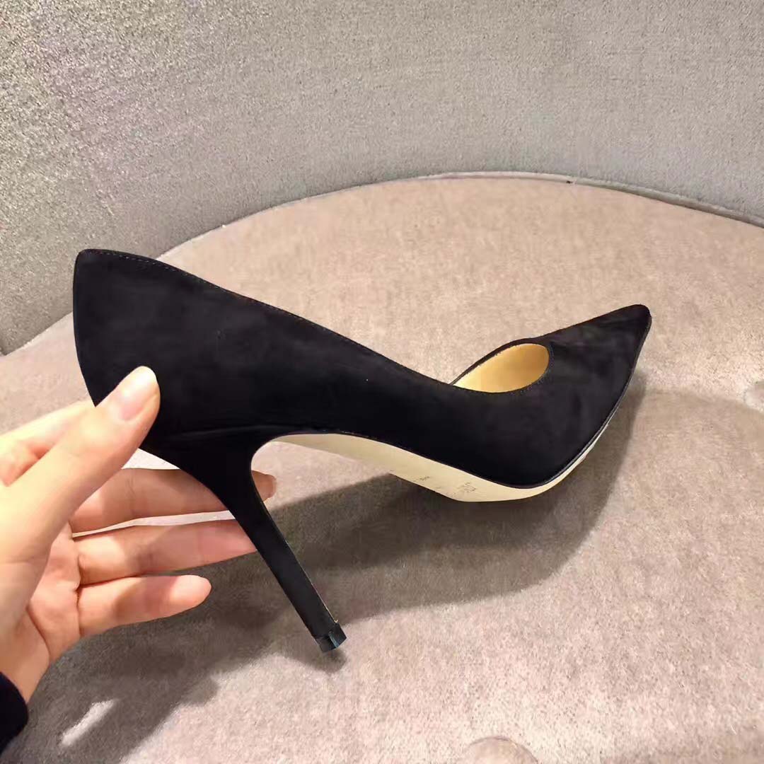 Back view showing heel height on Jimmy Choo Romy 100 black pumps