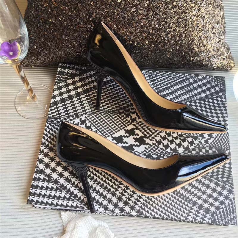 Back view showing slender heel of Jimmy Choo Romy 85 pumps in black