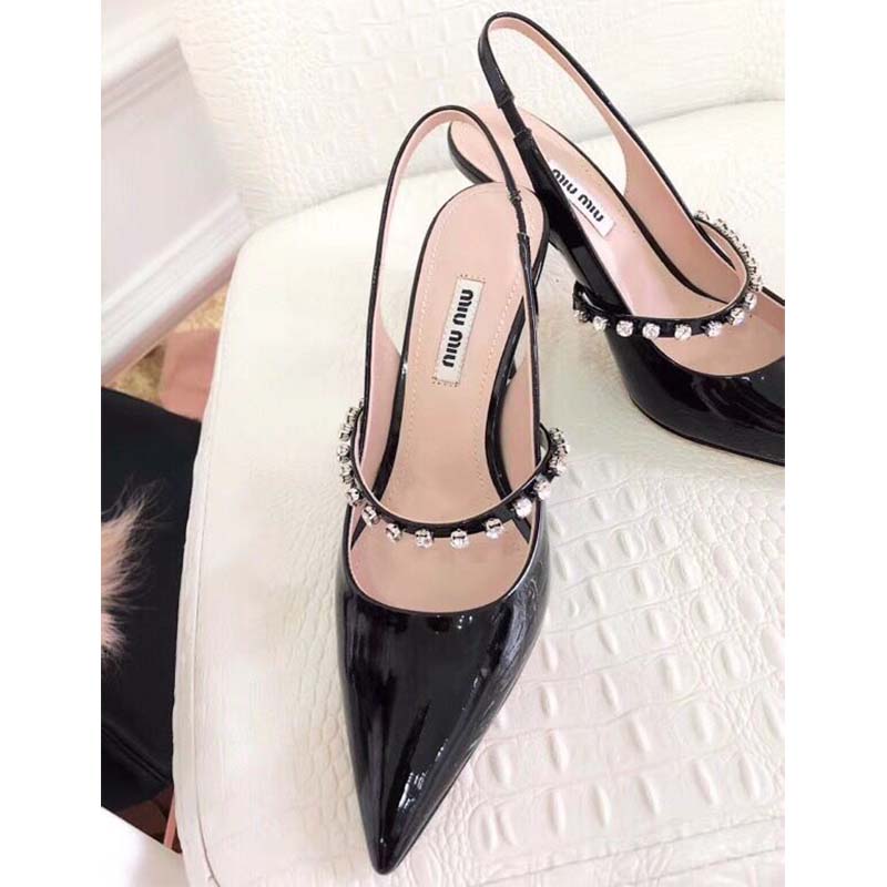Back angle showing heel height of Miu Miu Women Patent Leather Slingbacks